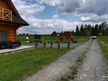 Фото номера Дом с 2 спальнями Шале Domki Masny Chochołów г. Koniówka 43