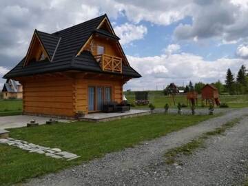 Фото номера Дом с 2 спальнями Шале Domki Masny Chochołów г. Koniówka 44