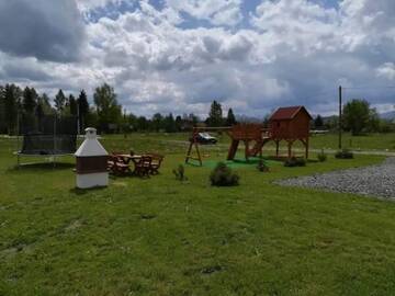 Фото номера Дом с 2 спальнями Шале Domki Masny Chochołów г. Koniówka 25
