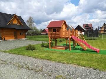 Фото номера Дом с 2 спальнями Шале Domki Masny Chochołów г. Koniówka 23